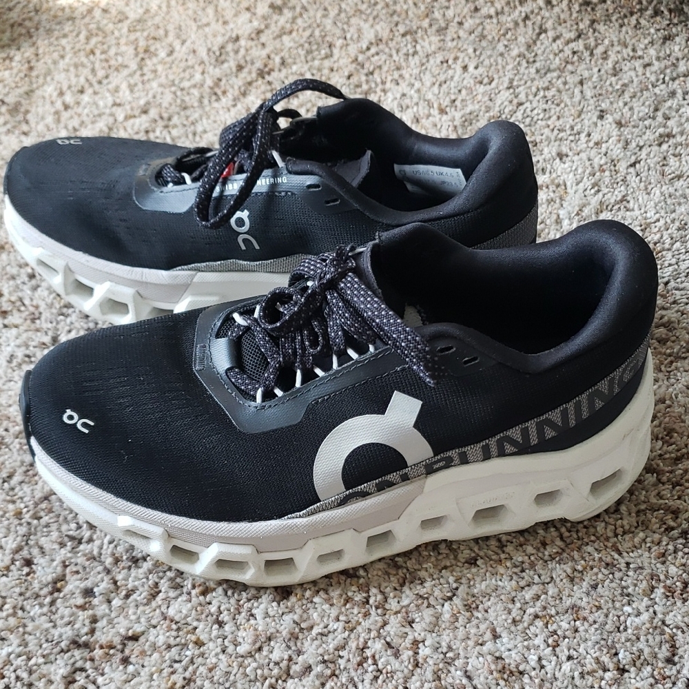 On Running Black and White Athletic Shoes